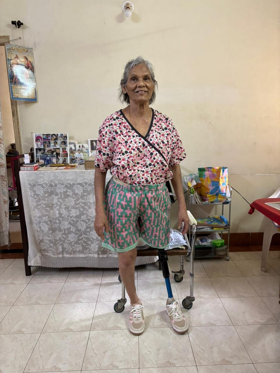 Patient walking with new prosthesis